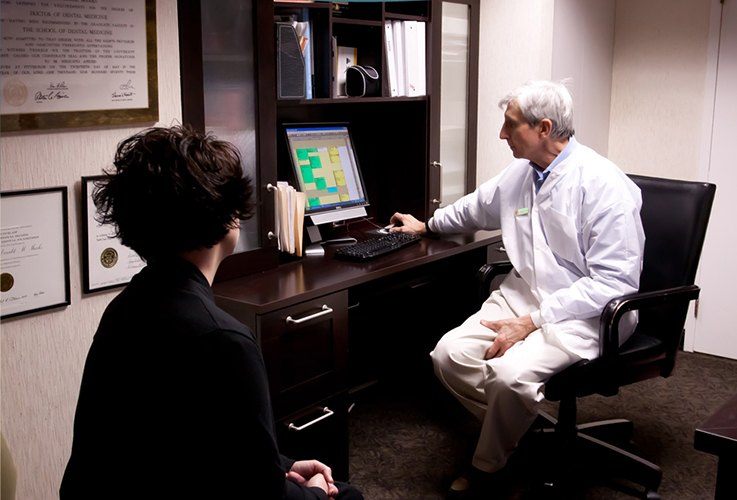 Dr. Marks in consultation room
