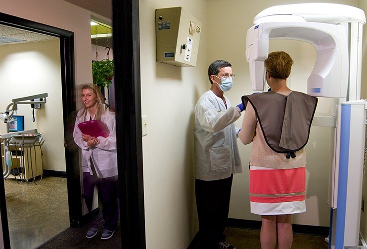 Patient receiving 3D cone beam scans