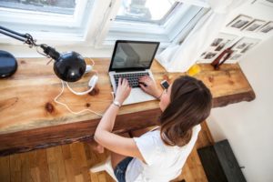 A woman on the computer.